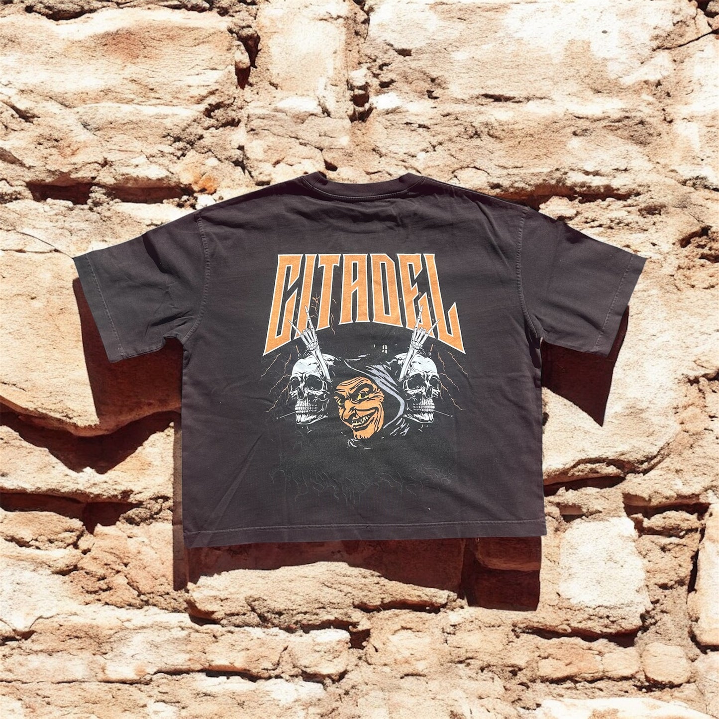 The metal head tee